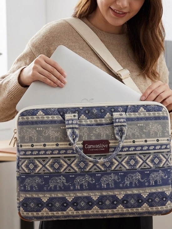 CanvasLove Handbags - Canvaslove laptop bag
Blue Tribal Print
Crossbody or Briefcase
Many pockets EUC